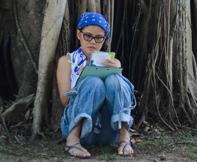 sitting alone at tree